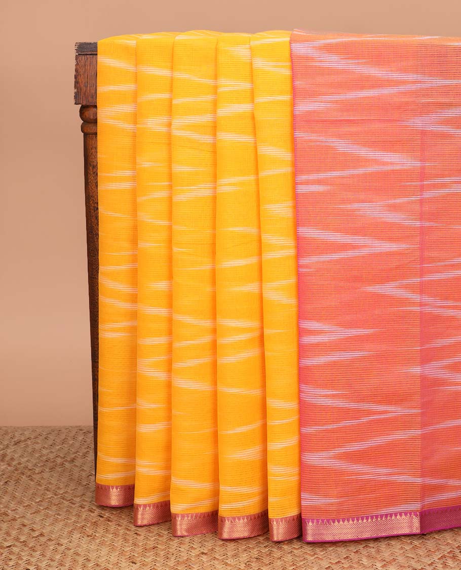 Orange striped Mangalagiri cotton saree, contrast traditional zari border, chevron striped pallu, and a contrast kalamkari floral printed blouse