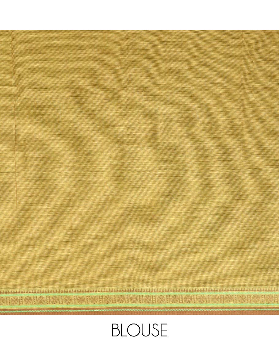 Green girl with a floral head motifs printed chirala cotton saree, traditional border, and pallu of stripes and kolam motifs print