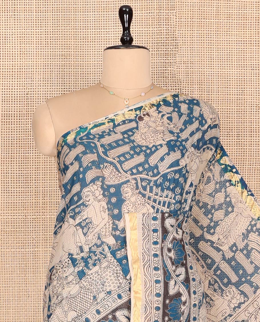 Blue Machine-Printed Kalamkari Cotton Saree Features Human Motifs, a Piping Border, Pallu of Peacocks, and a Matching Blouse