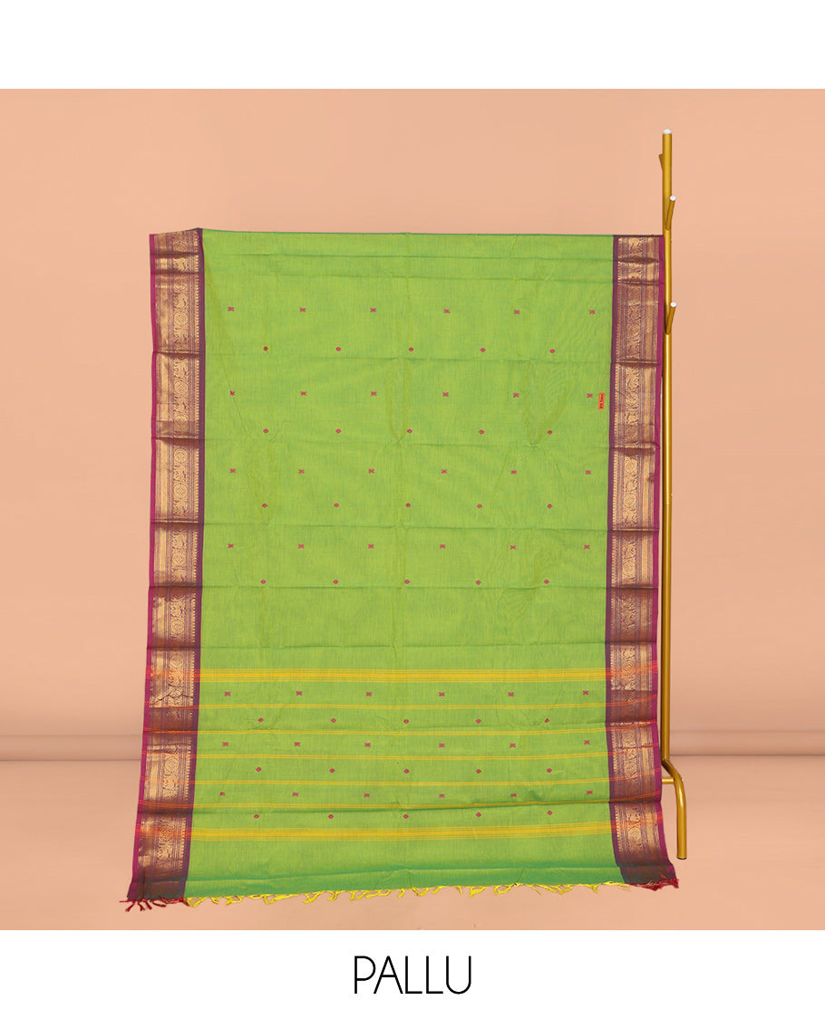 Parrot Green Chettinad Cotton Saree, Finely Crafted with Thread Buttas All Over Its Body, Complemented by a Contrast Traditional Zari Design Woven Border, Pallu of Stripes and Buttas, and Paired with a Matching Blouse