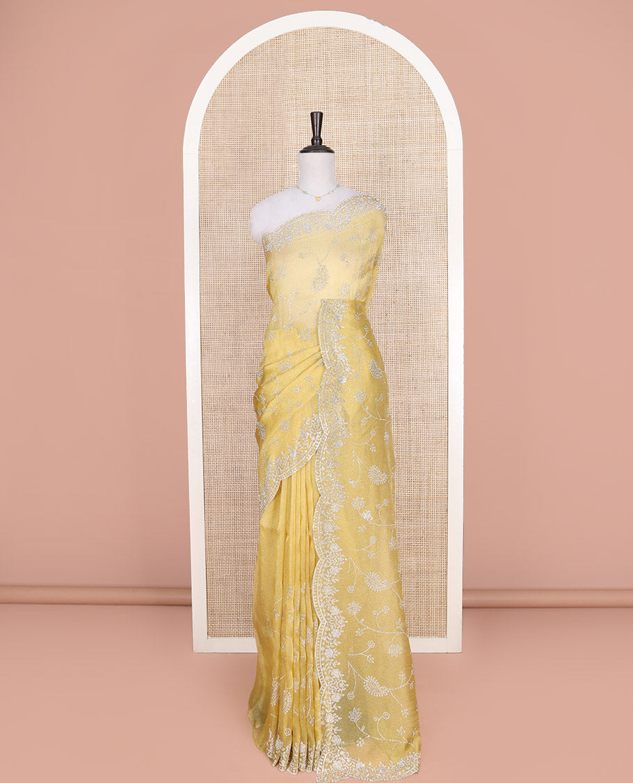 Pale Yellow Designer Saree, Mesmerized with Floral-Paisley Jaal Stone Work on Its Body, Highlighted by Scallop Stone Work Border, Pallu of Floral-Paisley Designs, and Paired with a Stone Work Matching Blouse