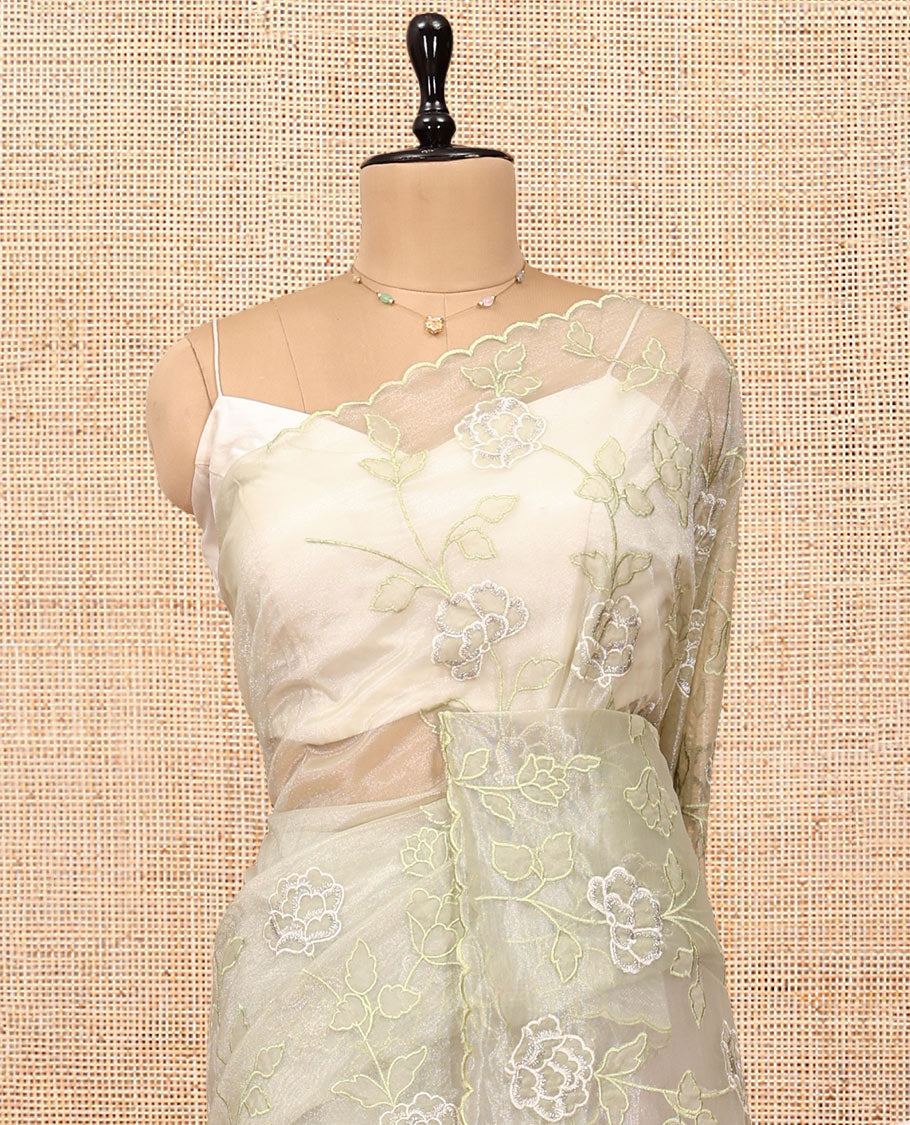 Pale Green Organza Saree, Delicately Woven with Floral Vine Embroidery, a Scallop Border, and a Matching Blouse
