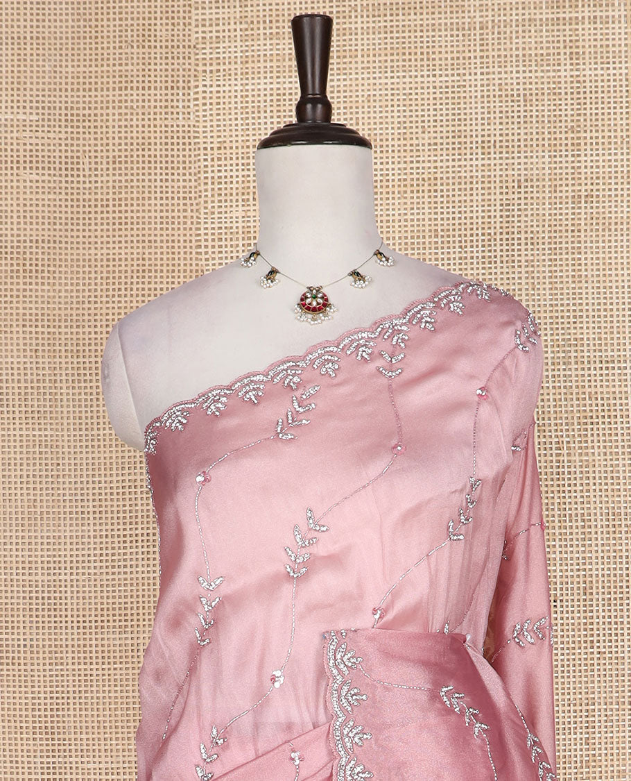 Pink diagonal floral vine embroidered designer saree, stone embroidered scallop border