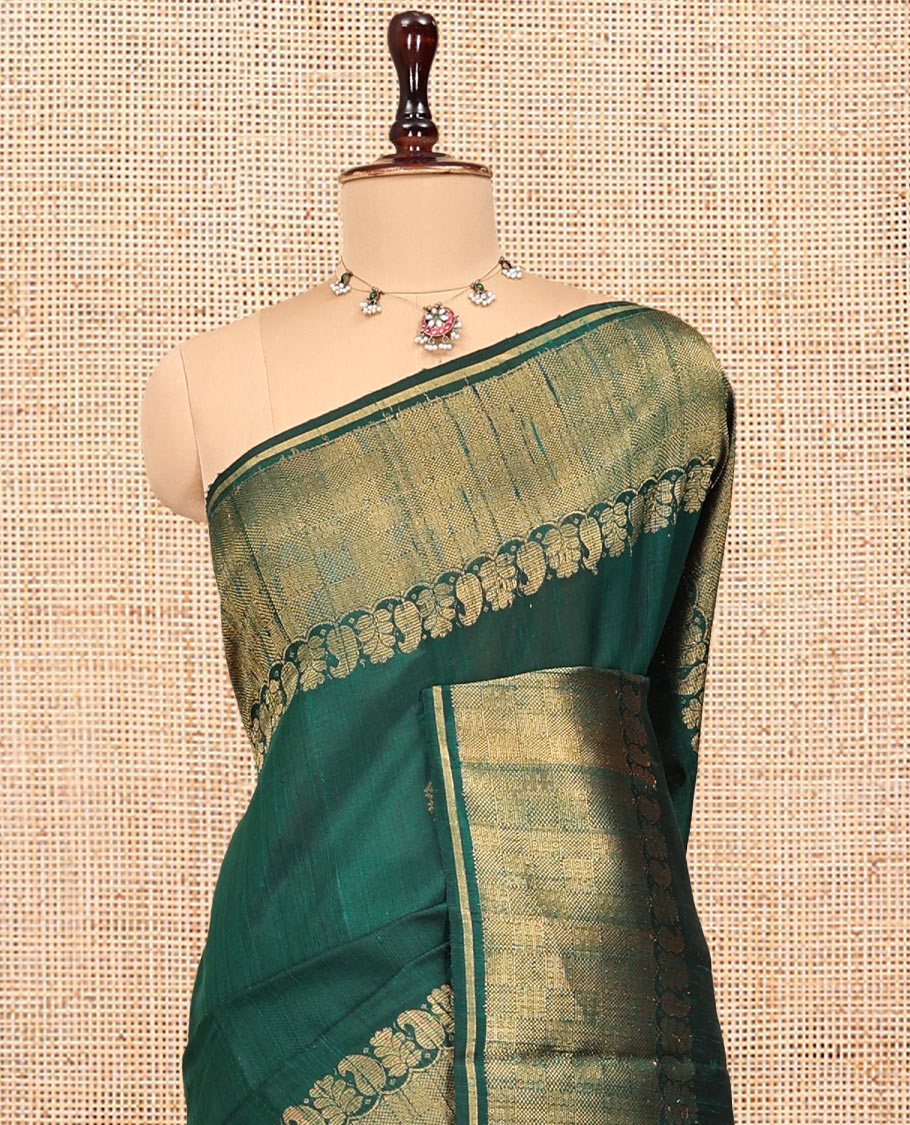 Green Dupion Silk Saree, Subtly Enriched with Buttas, a Traditional Border, Gleaming Zari Pallu, and a Matching Blouse