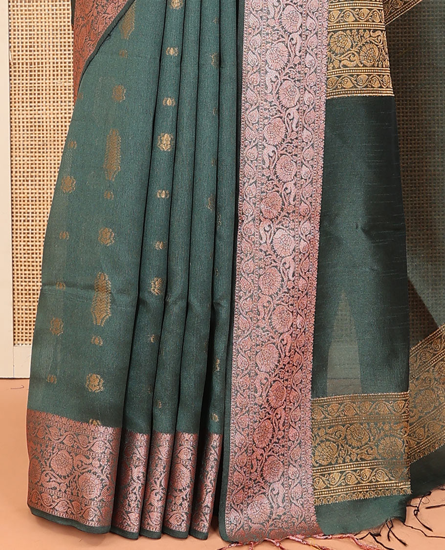 Green buttas dupion saree, floral creeper zari design border, and plain pallu flanked by floral creeper designs