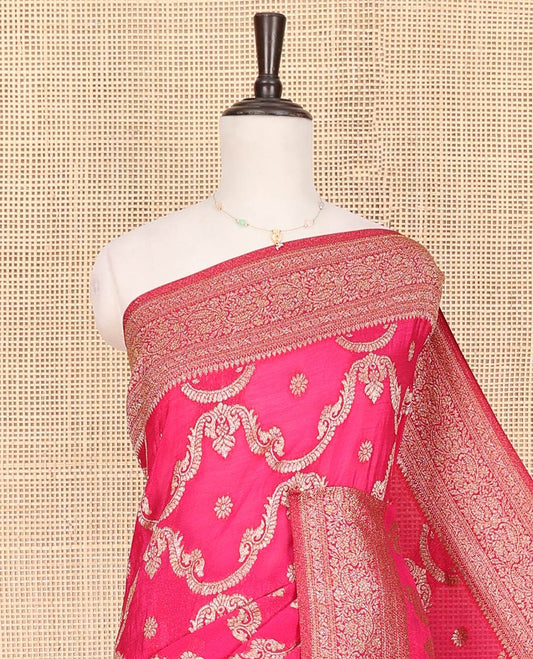 Pink Fancy Georgette Meticulously Designed with Zari Jacquard Designs, Zari Woven Border of Paisley Designs, Zari-Decked Up Pallu of Paisley Jaal Designs, and Paired with a Matching Blouse