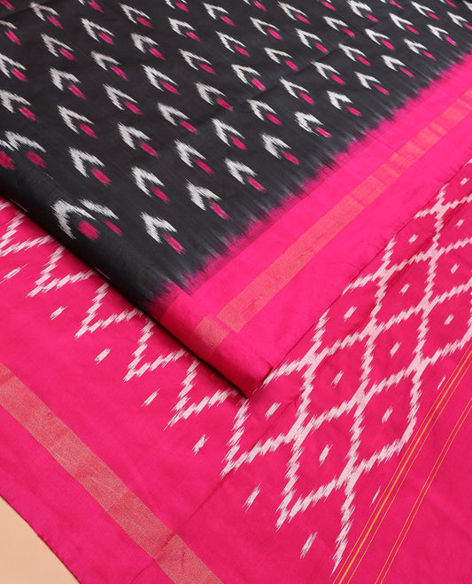 Black Ikkat Silk Saree with Colourful Ikkat Buttas, Beautified with a Contrasting Zari Striped Border, Vibrant Pallu of Jaal Design, and Paired with a Contrast Plain Blouse