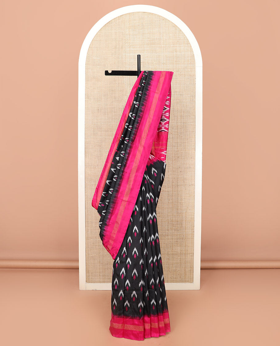 Black Ikkat Silk Saree with Colourful Ikkat Buttas, Beautified with a Contrasting Zari Striped Border, Vibrant Pallu of Jaal Design, and Paired with a Contrast Plain Blouse