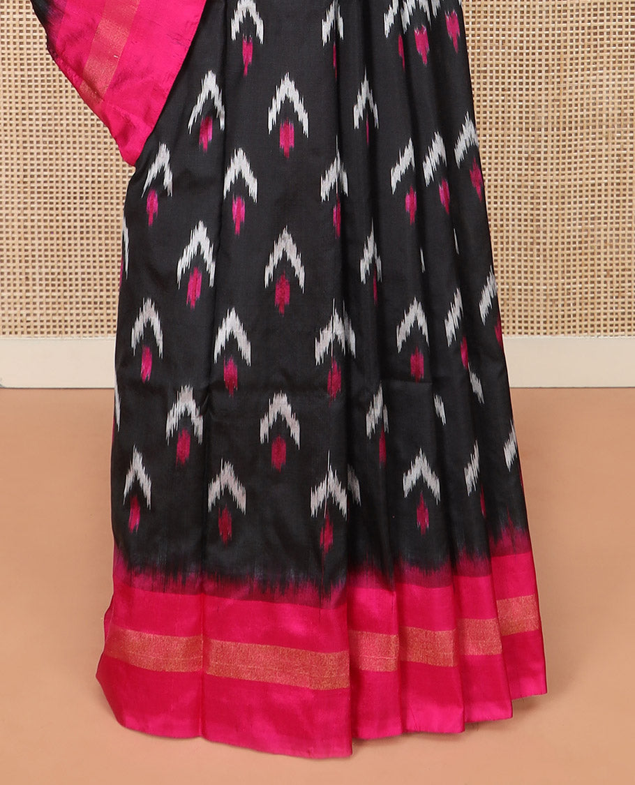 Black Ikkat Silk Saree with Colourful Ikkat Buttas, Beautified with a Contrasting Zari Striped Border, Vibrant Pallu of Jaal Design, and Paired with a Contrast Plain Blouse