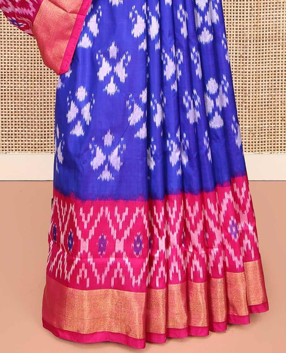 Royal Blue Pochampally Ikat Silk Saree, Adorned with Ikkat Buttas on Its Body, Complemented by a Contrast Ikkat-Style Woven Border, Pallu of Butta Enclosed Jaal Design, and Paired with a Contrast Blouse