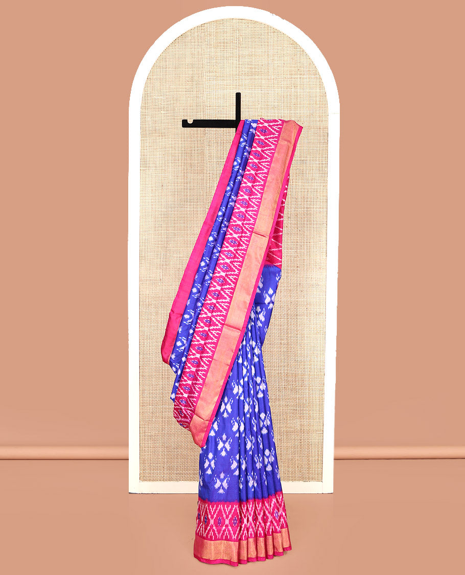 Royal Blue Pochampally Ikat Silk Saree, Adorned with Ikkat Buttas on Its Body, Complemented by a Contrast Ikkat-Style Woven Border, Pallu of Butta Enclosed Jaal Design, and Paired with a Contrast Blouse