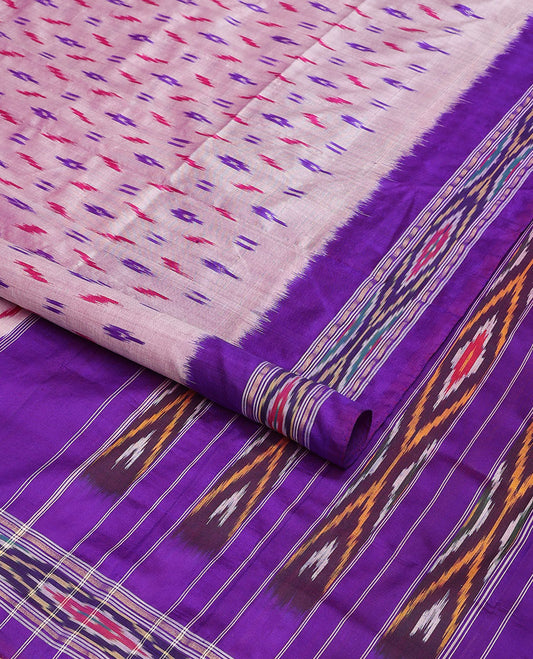 Pale pink ikkat saree with unique buttas, contrast ikkat border & pallu of ikkat designs