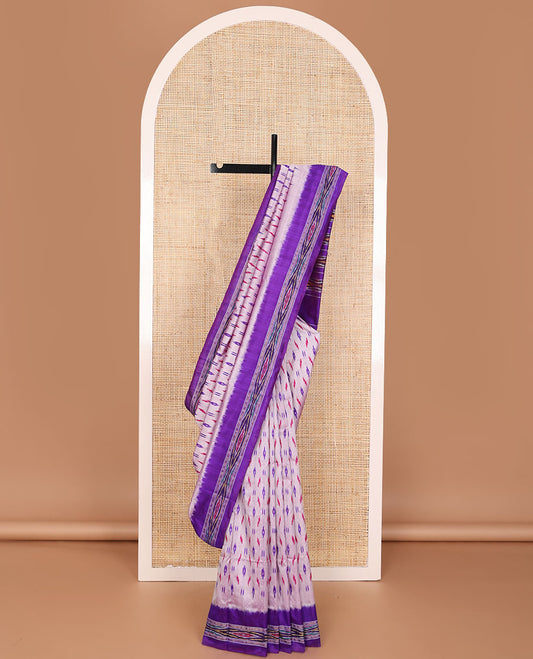 Pale pink ikkat saree with unique buttas, contrast ikkat border & pallu of ikkat designs