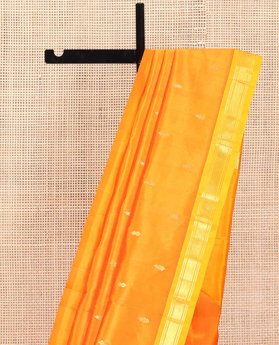 Orange Kanchipuram Silk Saree, Adorned with Zari Buttas, a Contrast One-Sided Border of Banaras, and Jaal Design, Zari-Woven Pallu, and No Blouse