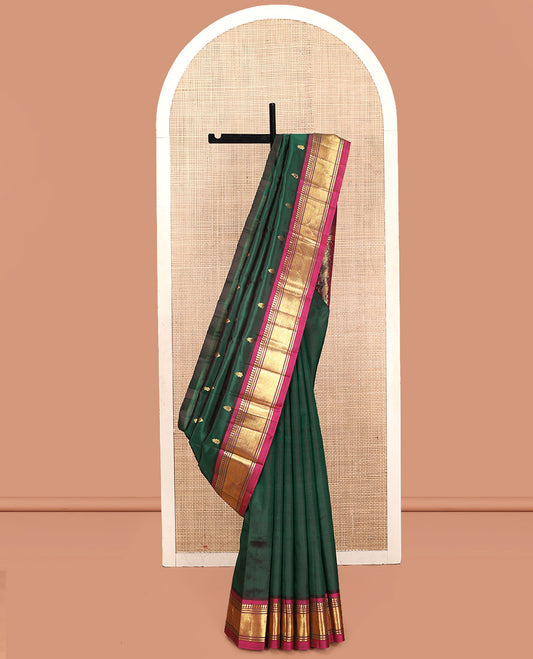Green Kanchipuram Silk Saree, Enthralled with Zari Buttas, Contrast Border of Paneer Sombu, Banaras, and Jaal, Pallu of Floral Creeper Design, and No Blouse