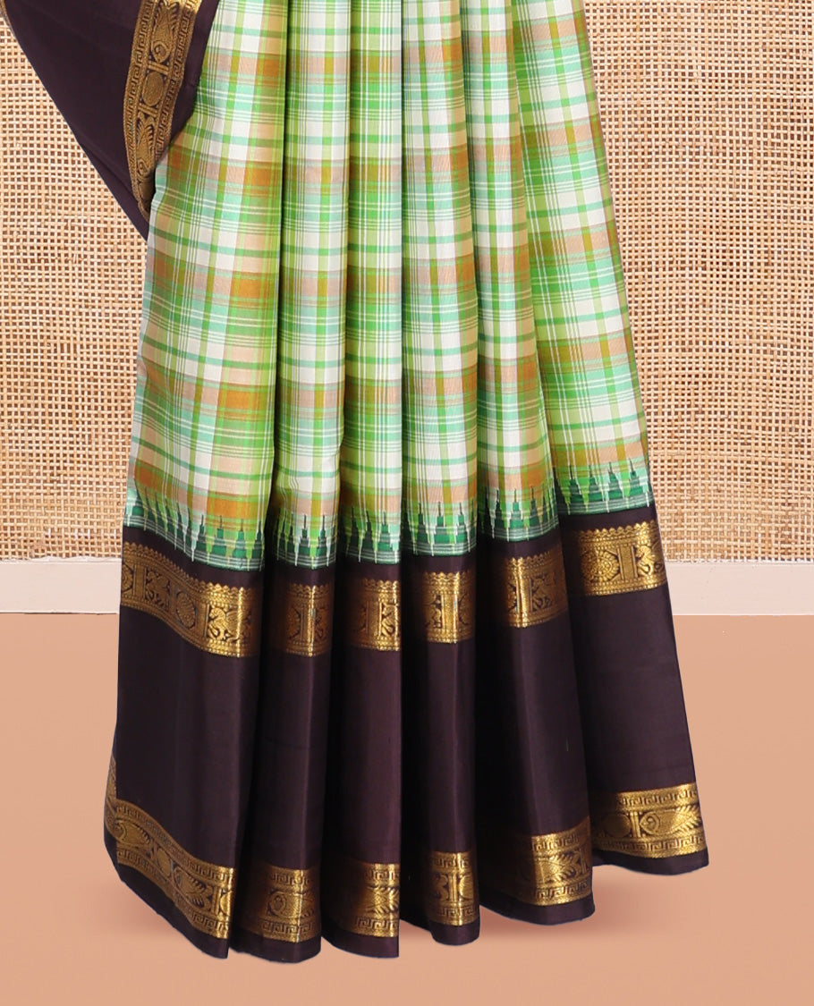 Green Checked Kanchipuram Silk Saree, a Contrast Rettai Pettu Temple Border of Chakram and Kuthirai Designs, Traditional Pallu, and Contrast Blouse