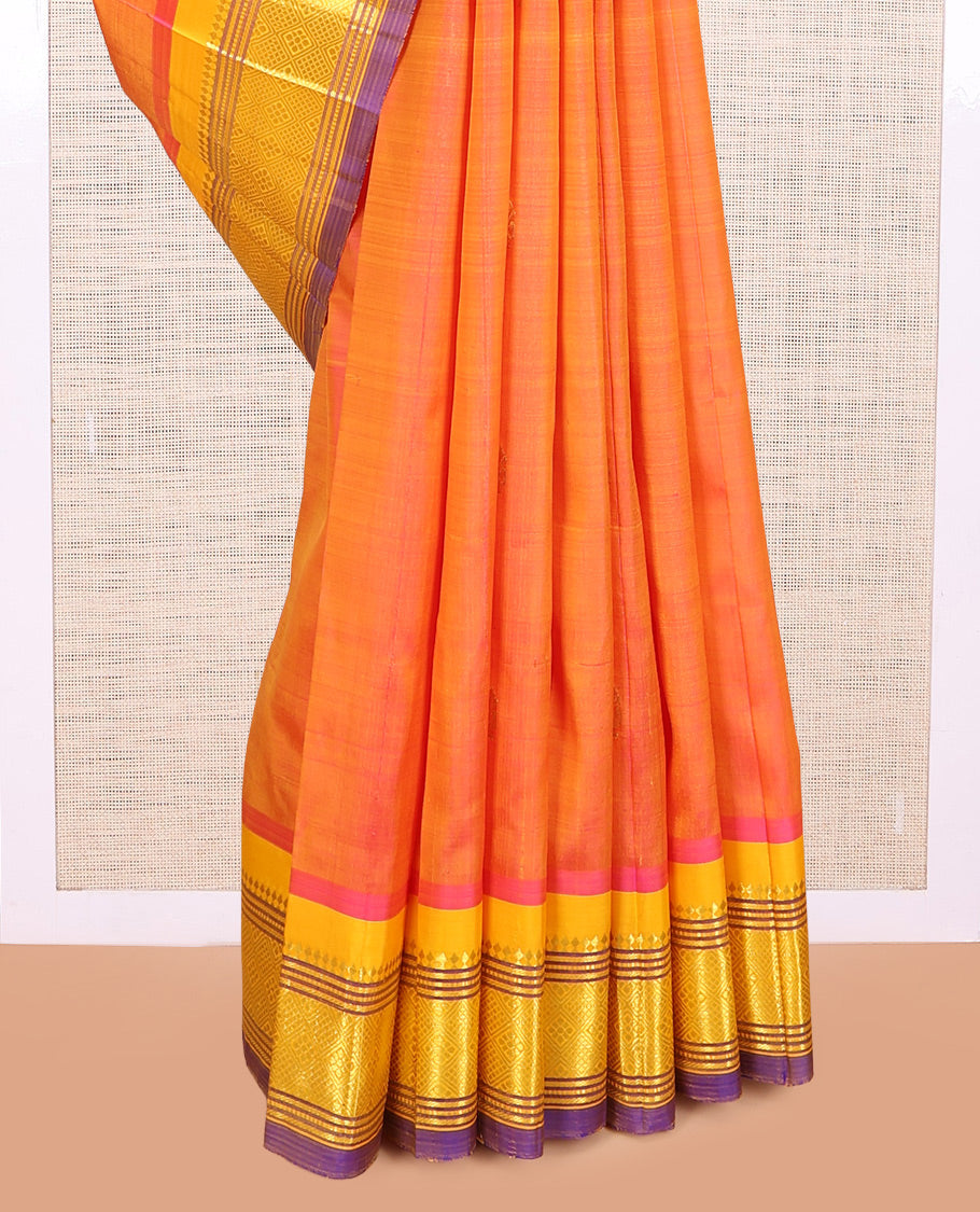 Orange Kanchipuram Silk Saree, Finely Crafted with Zari Buttas, a Contrast One-sided Border of Panner Sombu, Banaras, Muthu, and Jaal Designs, Zari Woven Pallu, and No Blouse