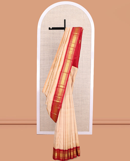 Sandal Kanchipuram Silk Saree, Adorned with Zari Buttas, a Contrast Korvai One-Sided Border of Banaras, Muthu, and Mayil Kann Design, Zari Design Pallu, and No Blouse