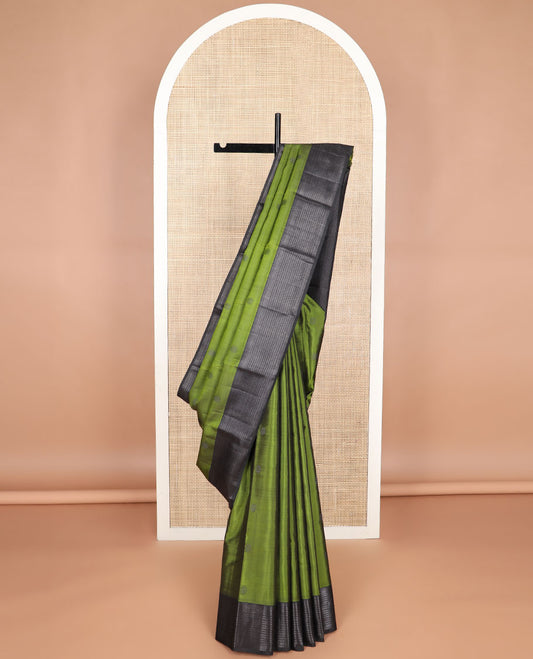 Green buttas kancheepuram silk saree with self border of thilakam mokku, muthu, banaras design & zari design pallu