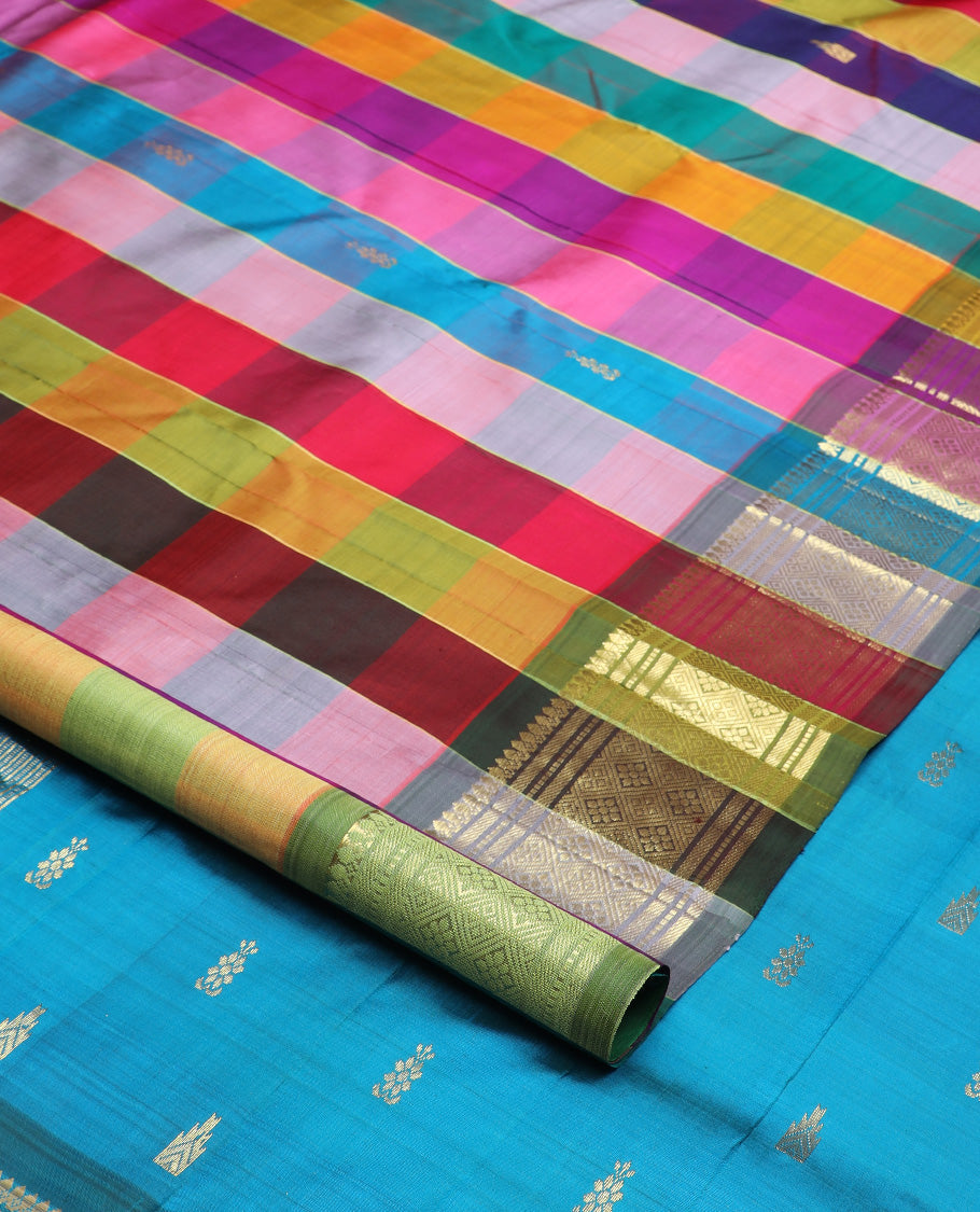 Multi-color checked and zari buttas Kanchipuram silk saree, one-sided border of thilakam mokku, banaras, muthu, and jaal and zari design pallu