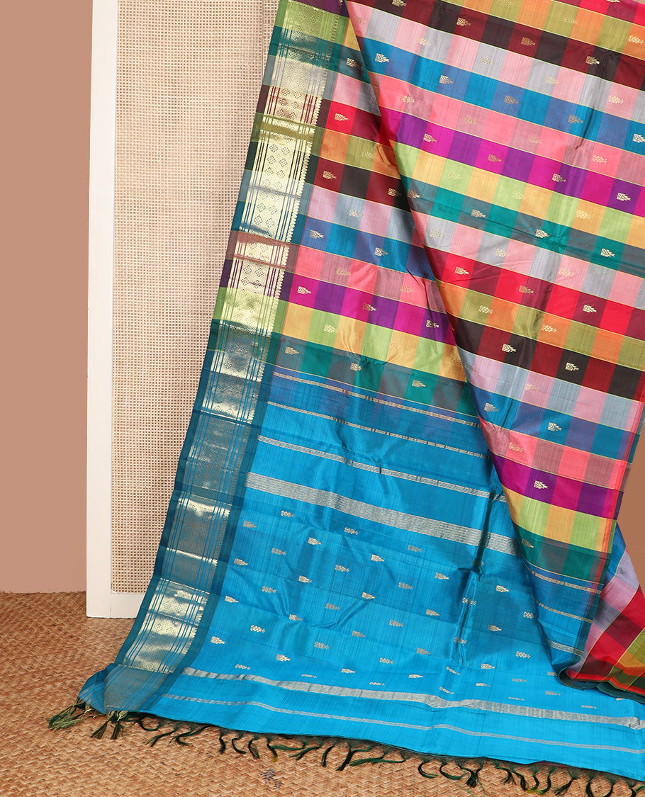 Multi-color checked and zari buttas Kanchipuram silk saree, one-sided border of thilakam mokku, banaras, muthu, and jaal and zari design pallu