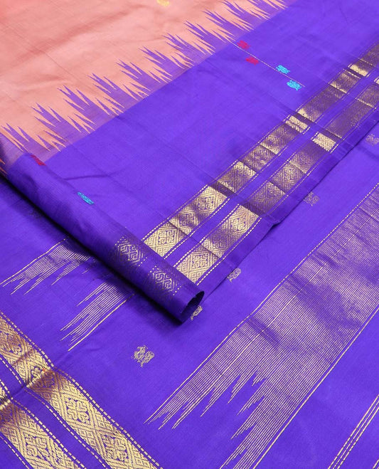 Peach zari buttas Kanchipuram silk saree, contrast one-sided thazampoo rekku border of thread mayil motifs and zari rettai pettu design, and zari design pallu