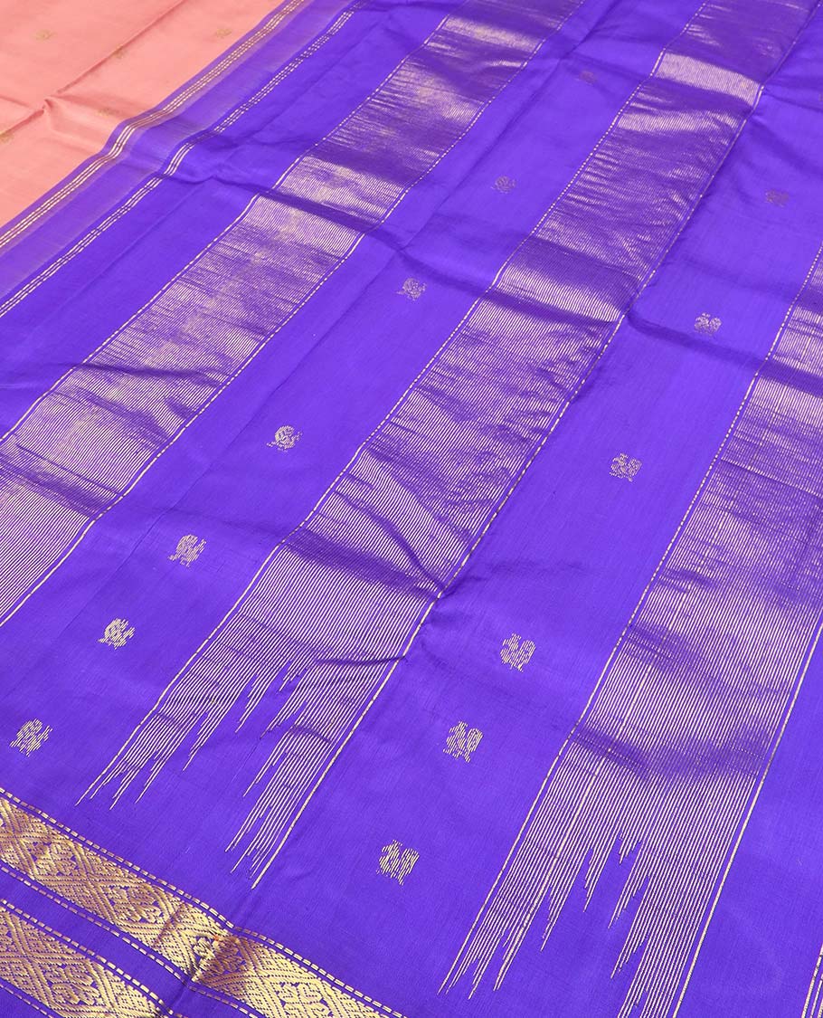 Peach zari buttas Kanchipuram silk saree, contrast one-sided thazampoo rekku border of thread mayil motifs and zari rettai pettu design, and zari design pallu