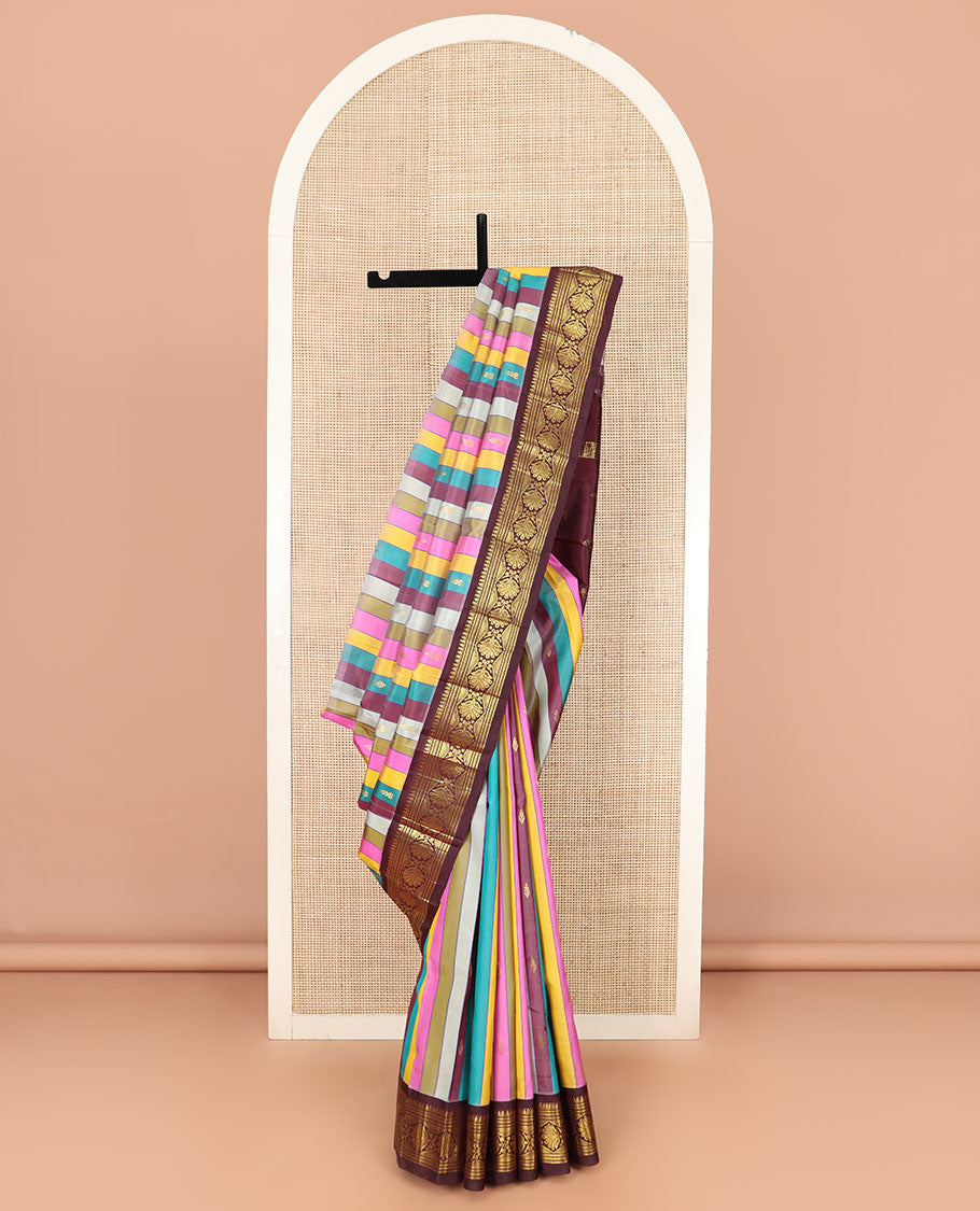 Multi-Color Kanchipuram Silk Saree Majestically Detailed with Stripes and Zari Buttas, Highlighted by Contrast One-Sided Korvai Border of Traditional Zari Designs, Grandly Woven Pallu of Zari Design, and Comes Without a Blouse