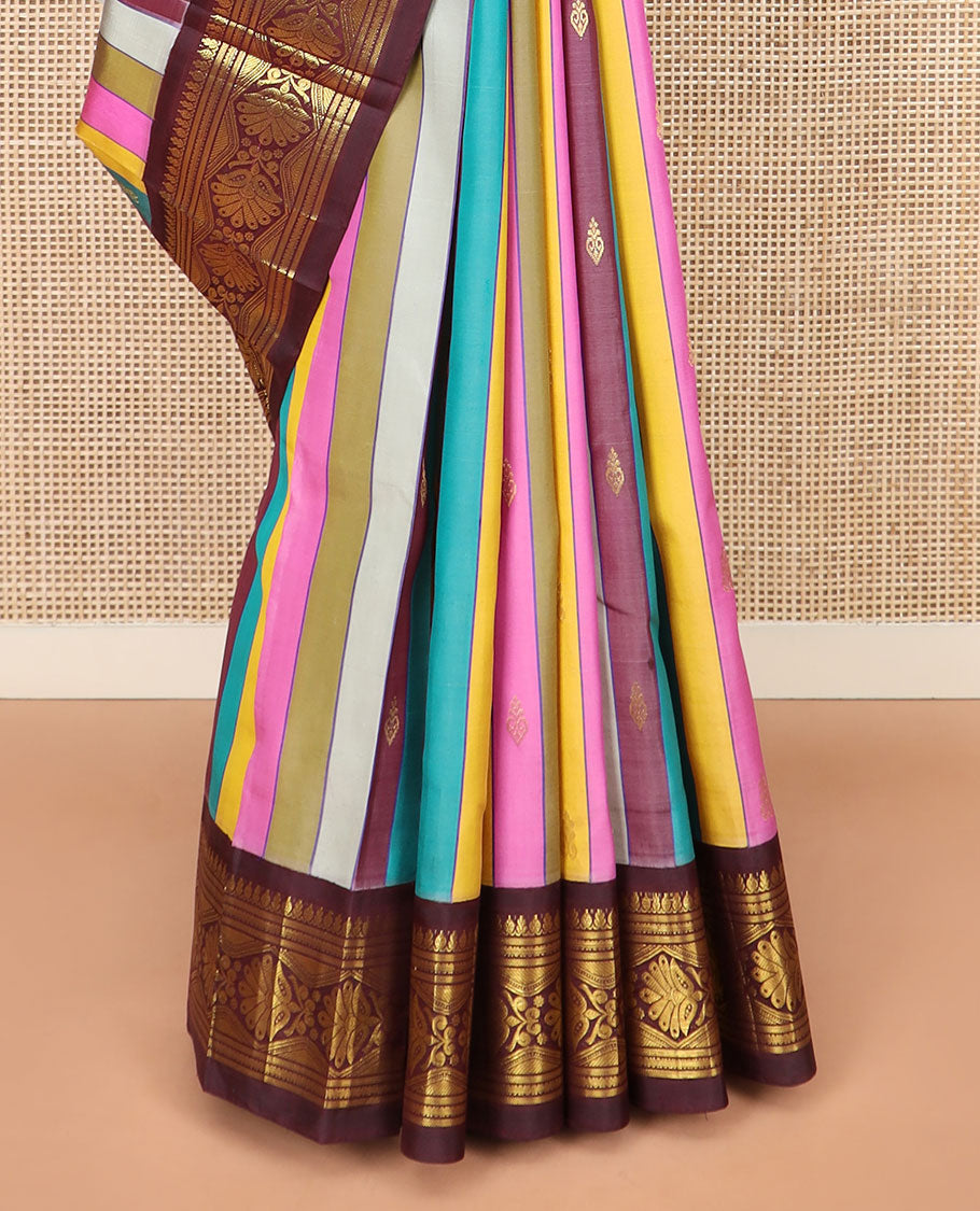Multi-Color Kanchipuram Silk Saree Majestically Detailed with Stripes and Zari Buttas, Highlighted by Contrast One-Sided Korvai Border of Traditional Zari Designs, Grandly Woven Pallu of Zari Design, and Comes Without a Blouse