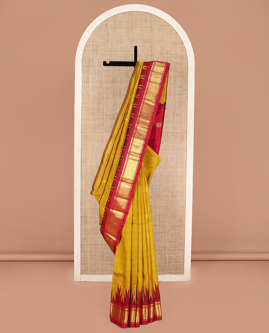 Yellow Kanchipuram Silk Saree, Accentuated with Zari Buttas on Its Body, Complemented by Contrast One-Sided  Thazampoo Rekku Border of Thilakam Mokku, Banaras, and Jaal Designs, Pallu of Zari Designs, and Comes Without a Blouse