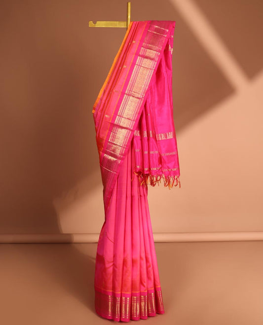 Pink zari buttas Kanchipuram silksaree,contrast border of thilakam mokku, muthu & jaal & pallu of zari stripes & buttas