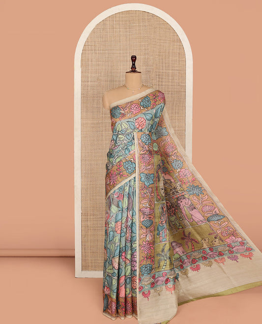 Blue Semi-Tussar Saree Gracefully Embellished with Kalamkari-Style Floral Vine Print, Captivating Contrast Floral Printed Border, Pallu Depicting Ancient Figurines Print, and Paired with a Contrast Printed Blouse