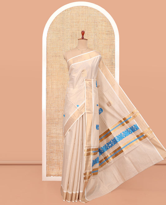 Cream Kerala Cotton Saree, Bedecked with Thread and Zari Buttas All Over Its Body, a Zari Bavanji Border, Pallu of Intricate Designs, and Paired with a Matching Blouse