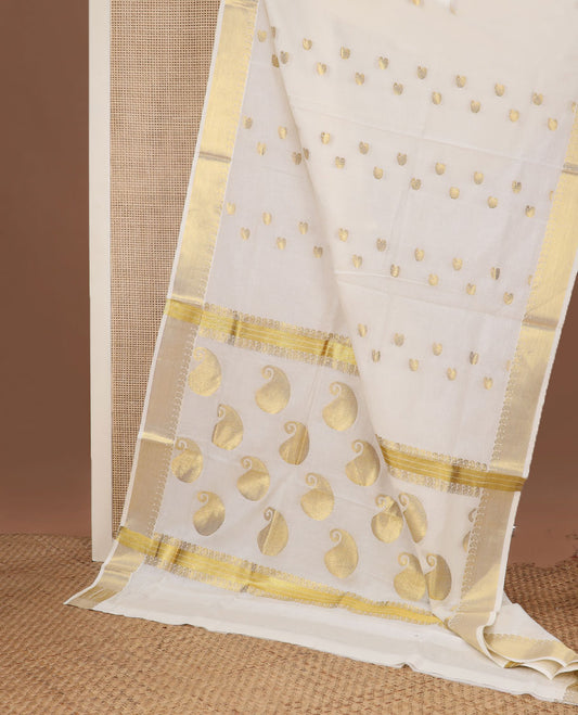 Cream paisley buttas Kerala saree, zari border, and pallu of paisleys in zari