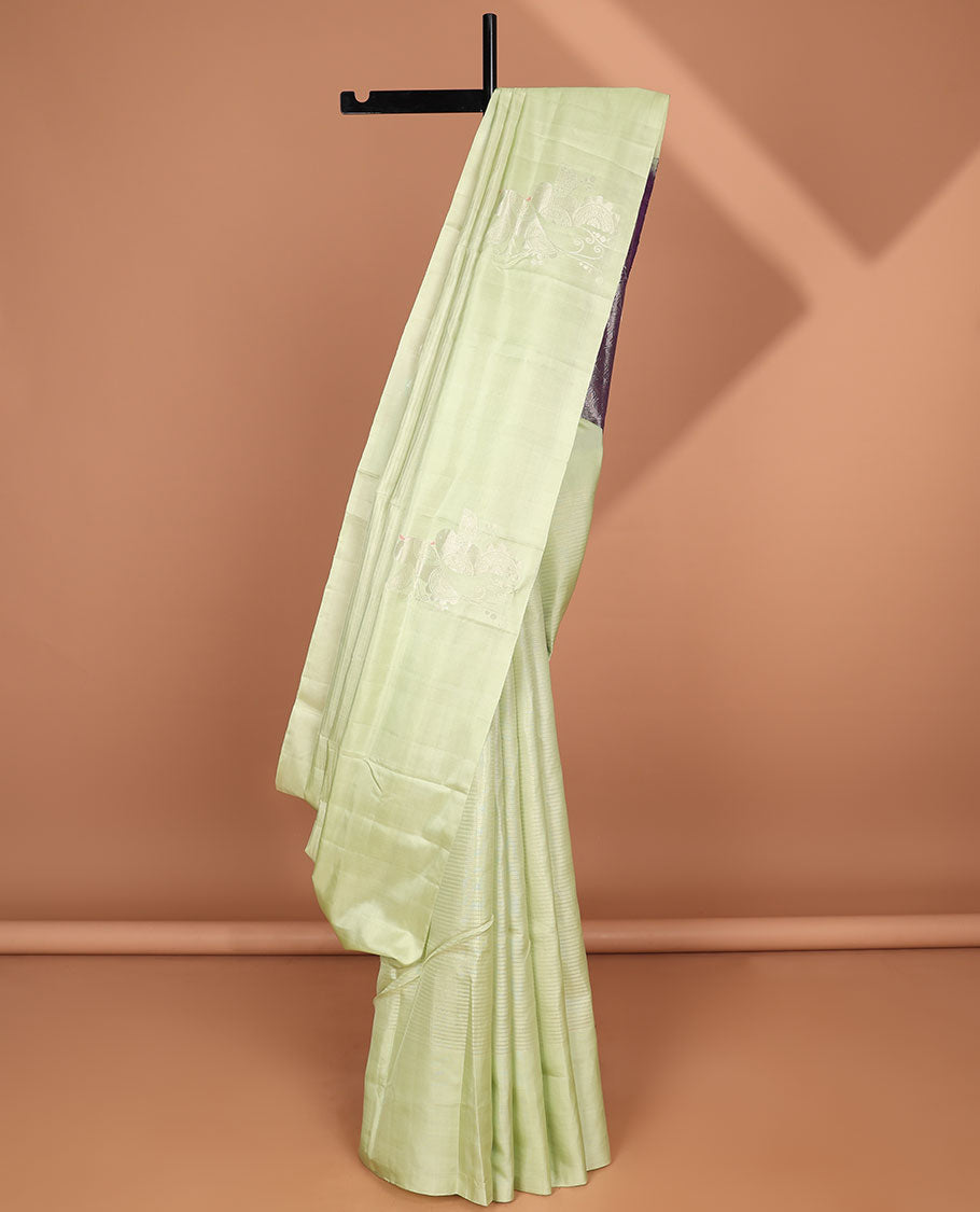 Borderless green soft silk saree with zari designs, contrast pallu of banaras,mayil kann,poun, diamond & manga design