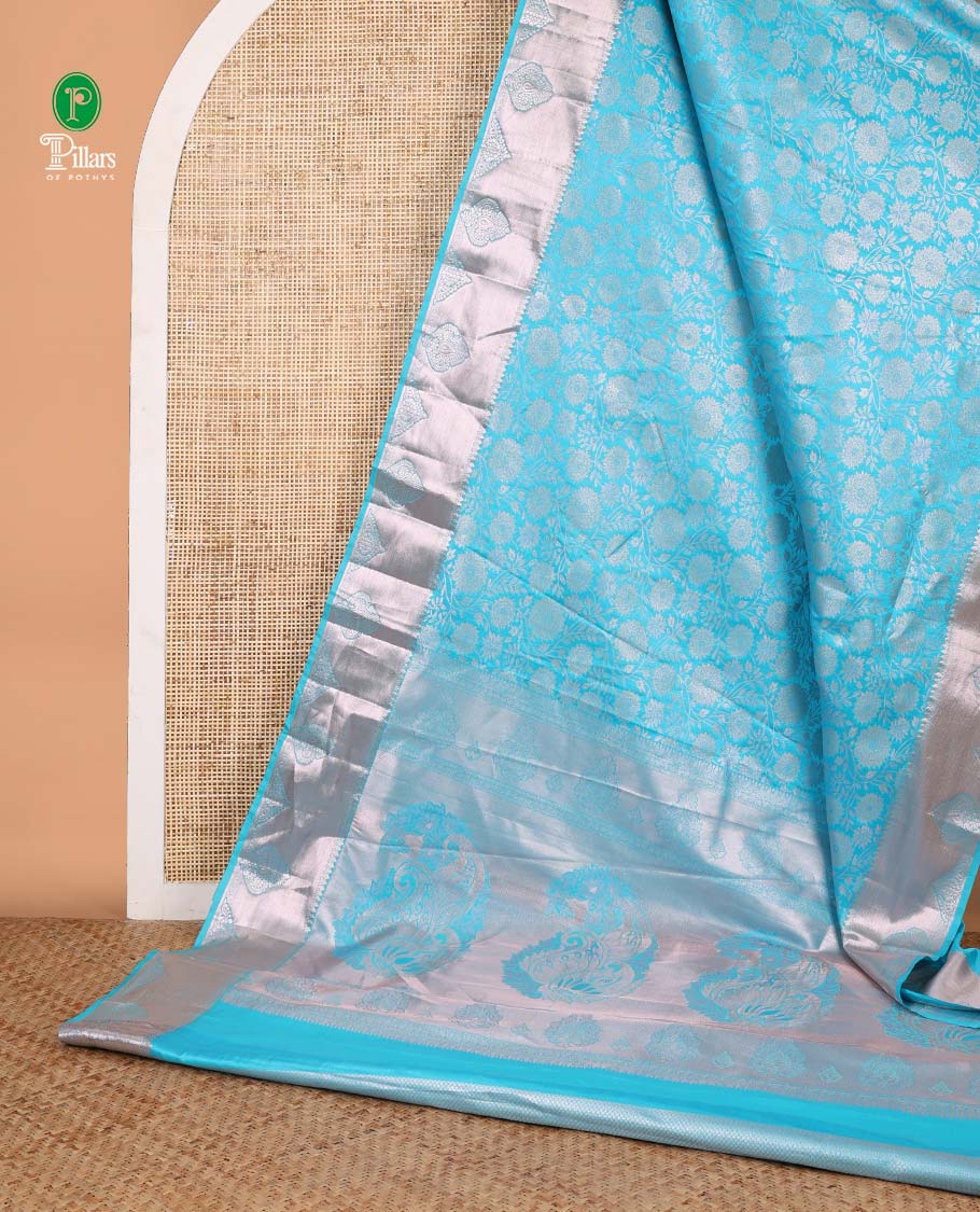 Blue zari flower brocade design soft silk saree with bawanchi, butta border & rich weaving pallu along with brocade blouse