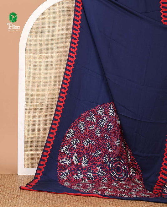 Navy blue plain gajji silk saree features a temple-printed border, a circular-shaped vine-patterned pallu, and a unique motif-printed blouse