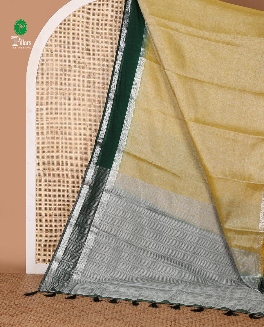 Lemon yellow plain design Tissue silk saree, contrast traditional zari border of bentex design & lined pallu with tassels