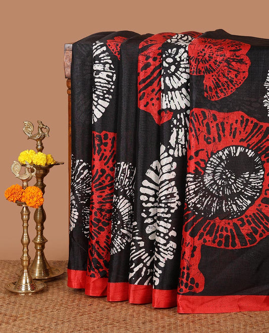 Black batik-style uniquely printed khadi cotton saree, contrast orange piping border & printed pallu