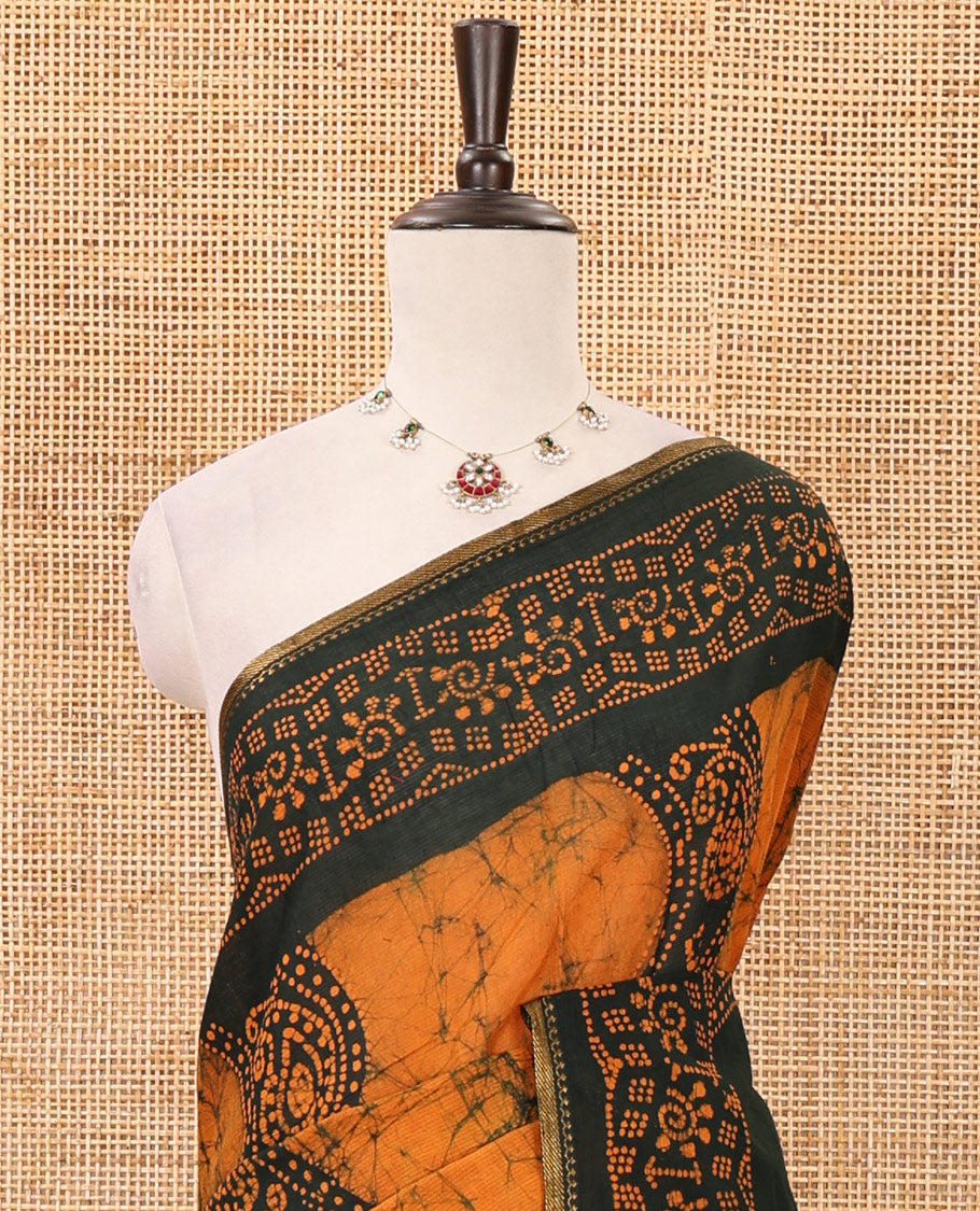 Mustard batik-printed sungudi cotton saree, mango zari small border, batik-printed pallu & running blouse