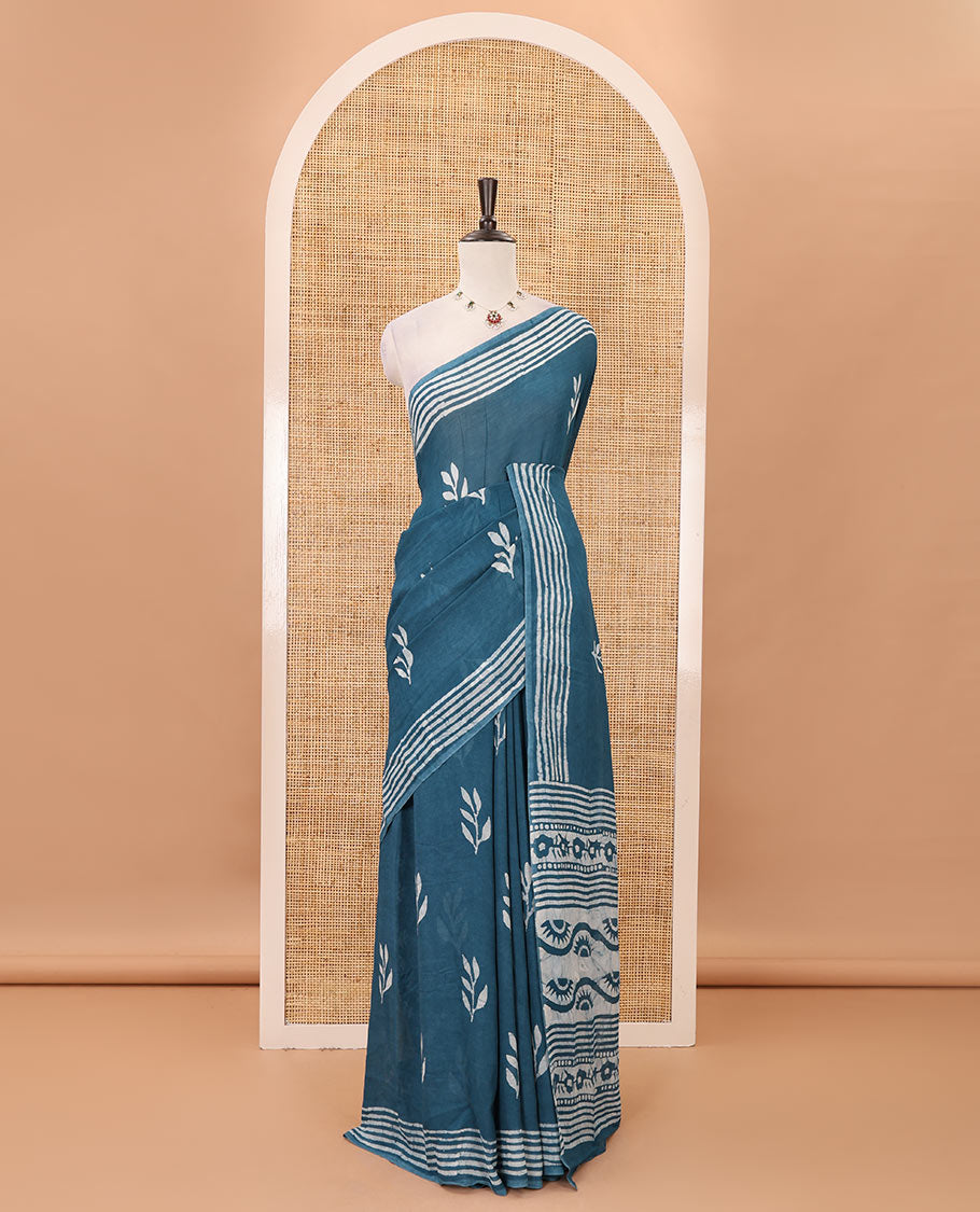Blue leaf batik printed georgette saree, batik-printed striped border, floral-geometric batik printed pallu & batik printed blouse