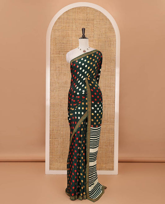 Green colorful polka dots printed satin crepe saree, contrast piping border, stripes printed pallu & contrast printed blouse