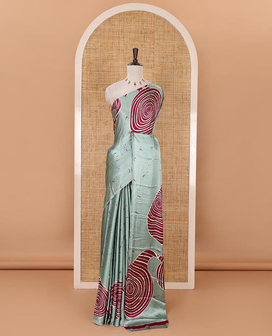 Borderless green batik-style spiral printed satin crepe saree, printed pallu & matching printed blouse