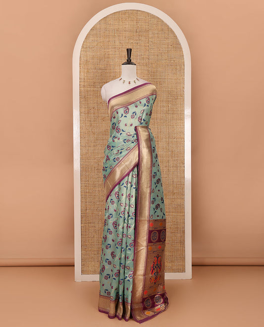 Sea green floral & paisley vine tissue silk saree, contrast temple border, paithani-style peacock & muniya pallu & contrast zari buttas blouse