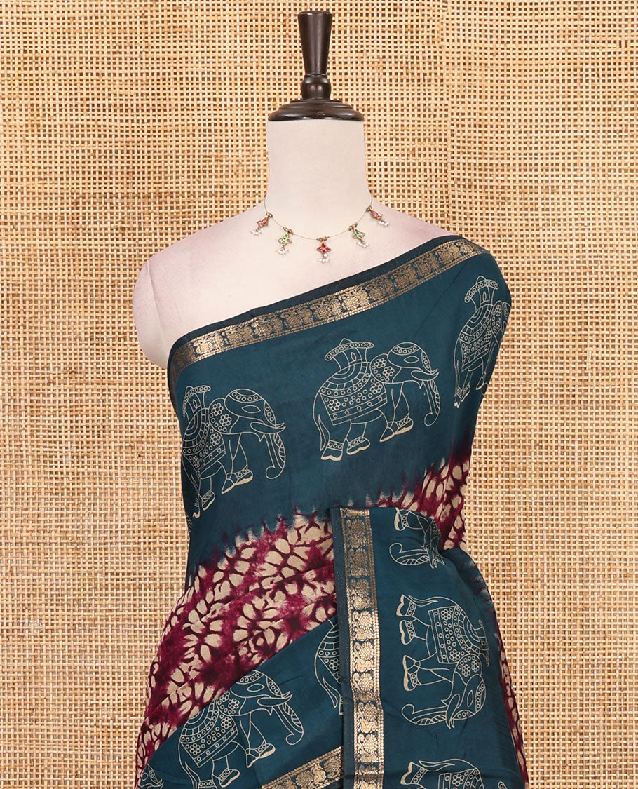 Wine diamond patterns Shibori-style printed muslin cotton saree, contrast elephant motifs printed border, batik elephant motifs pallu & contrast flower buttas printed blouse