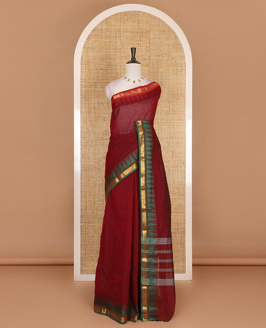 Maroon plain Chettinad cotton saree, contrast ganga jamuna temple zari border, striped pallu, and plain blouse