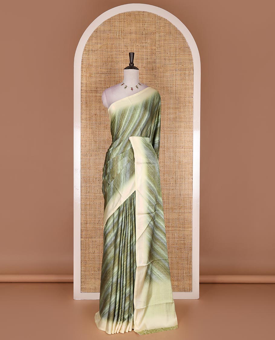 Mehendi green leheriya style hand brush printed satin crepe saree, contrast border, plain pallu, and floral vine printed blouse