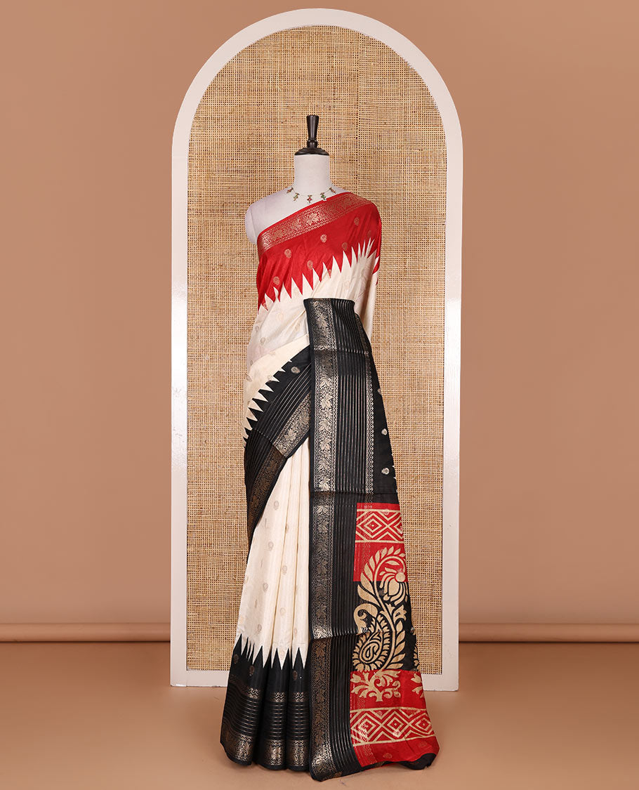 Cream zari buttas dola silk saree, contrast red-black temple ganga jamuna traditional zari border, paisley pallu, and contrast zari design blouse