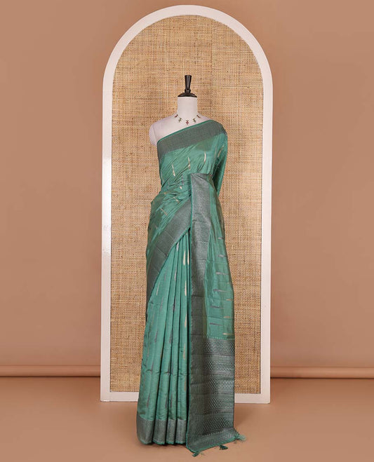 Green buttas woven semi-tussar saree, zari border, geometric patterned pallu, and a matching blouse