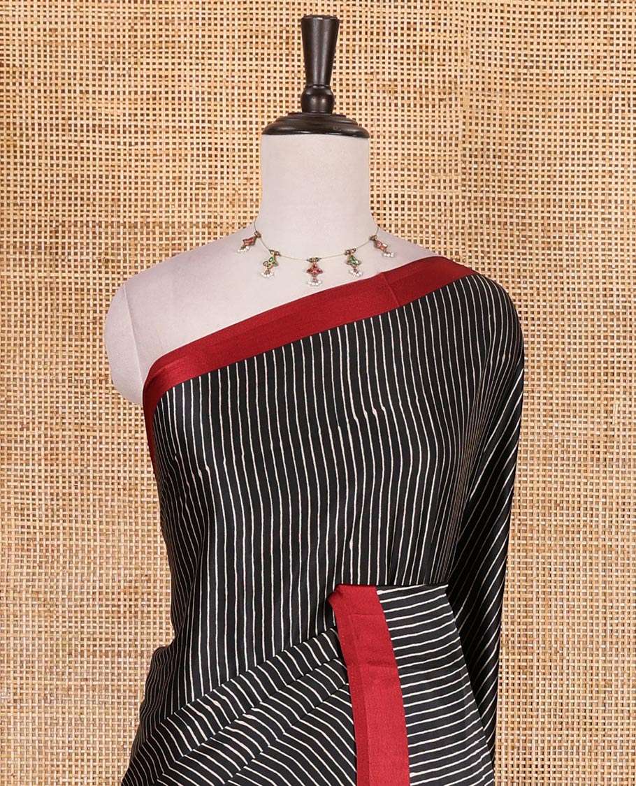 Black vertical striped gaji silk saree, contrast plain border, ajrakh printed pallu and contrast plain blouse